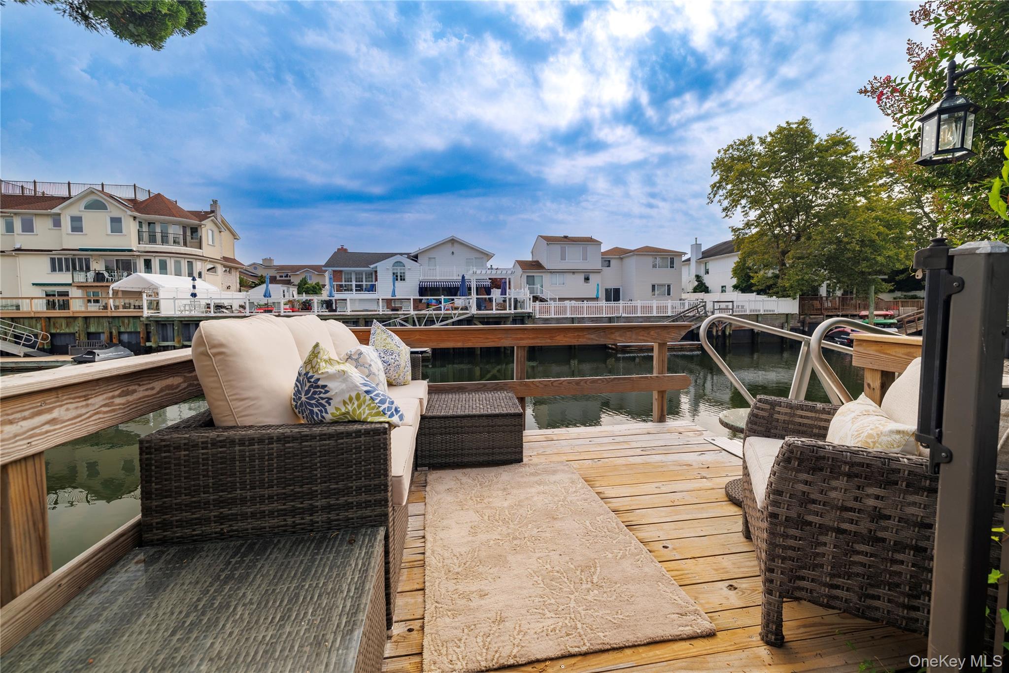2863 Harbor Road Merrick, NY 11566 - Photo 30 of 35 a view of roof deck with seating space and trees