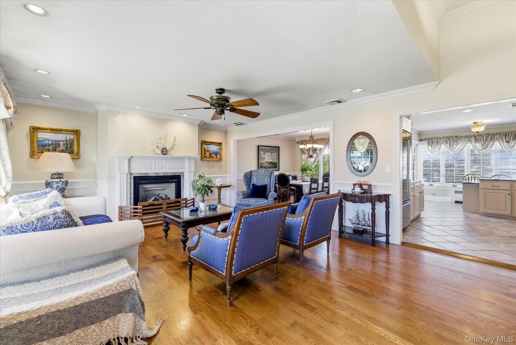 2863 Harbor Road Merrick, NY 11566 - Photo 3 of 35 a living room with furniture and a fireplace