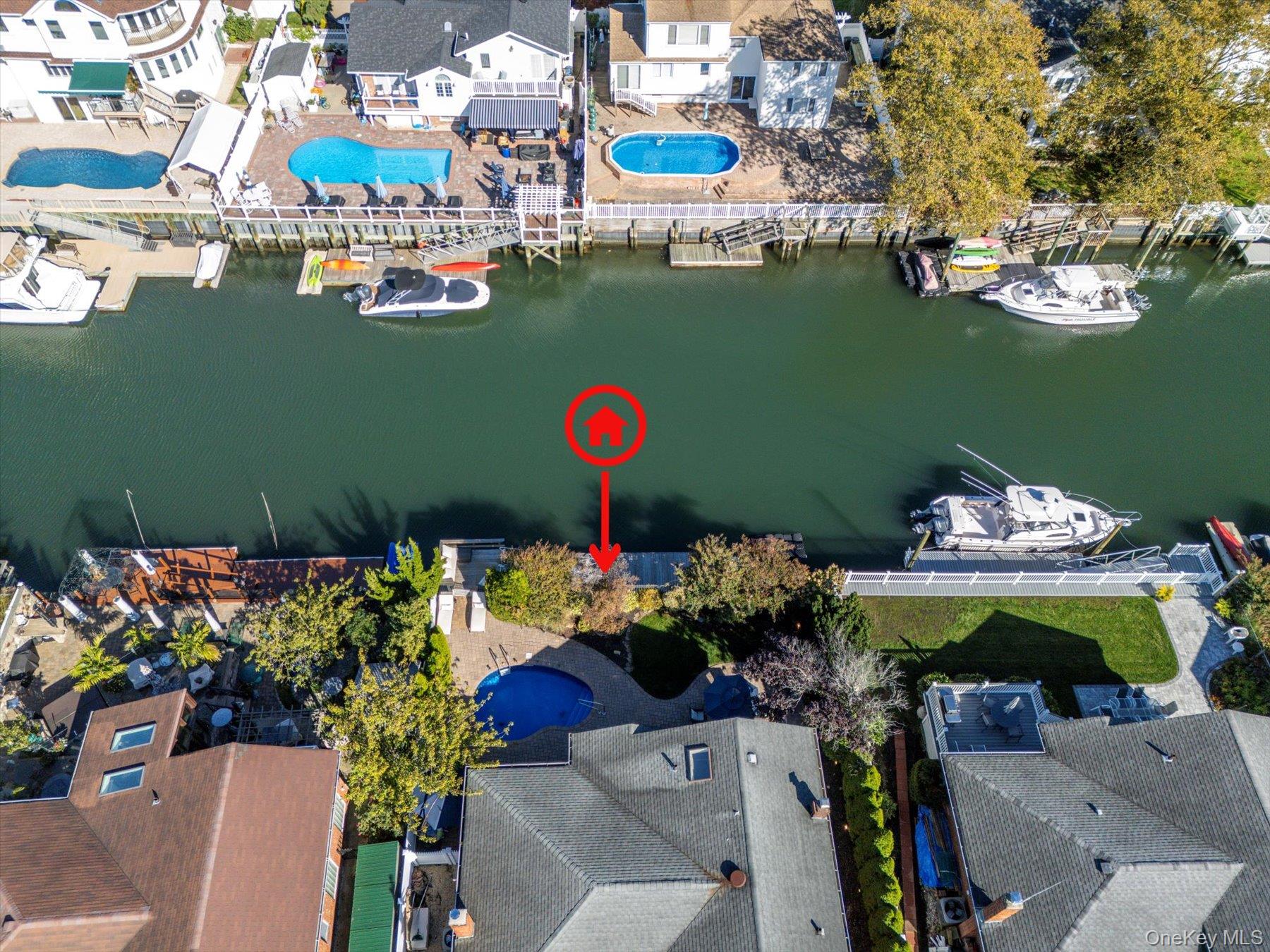 2863 Harbor Road Merrick, NY 11566 - Photo 34 of 35 a view of a chairs and table in a backyard