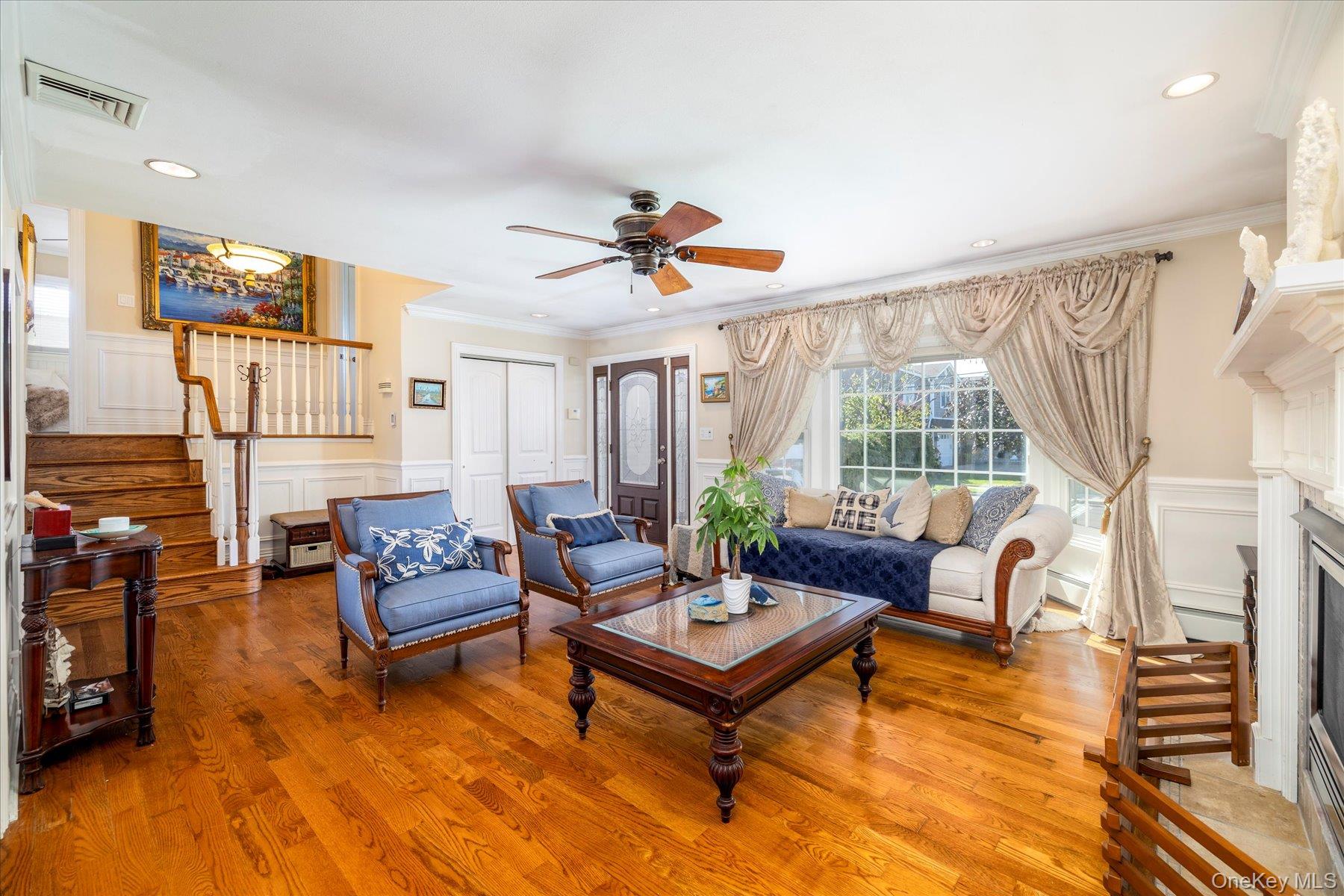 2863 Harbor Road Merrick, NY 11566 - Photo 4 of 35 a living room with furniture and a large window