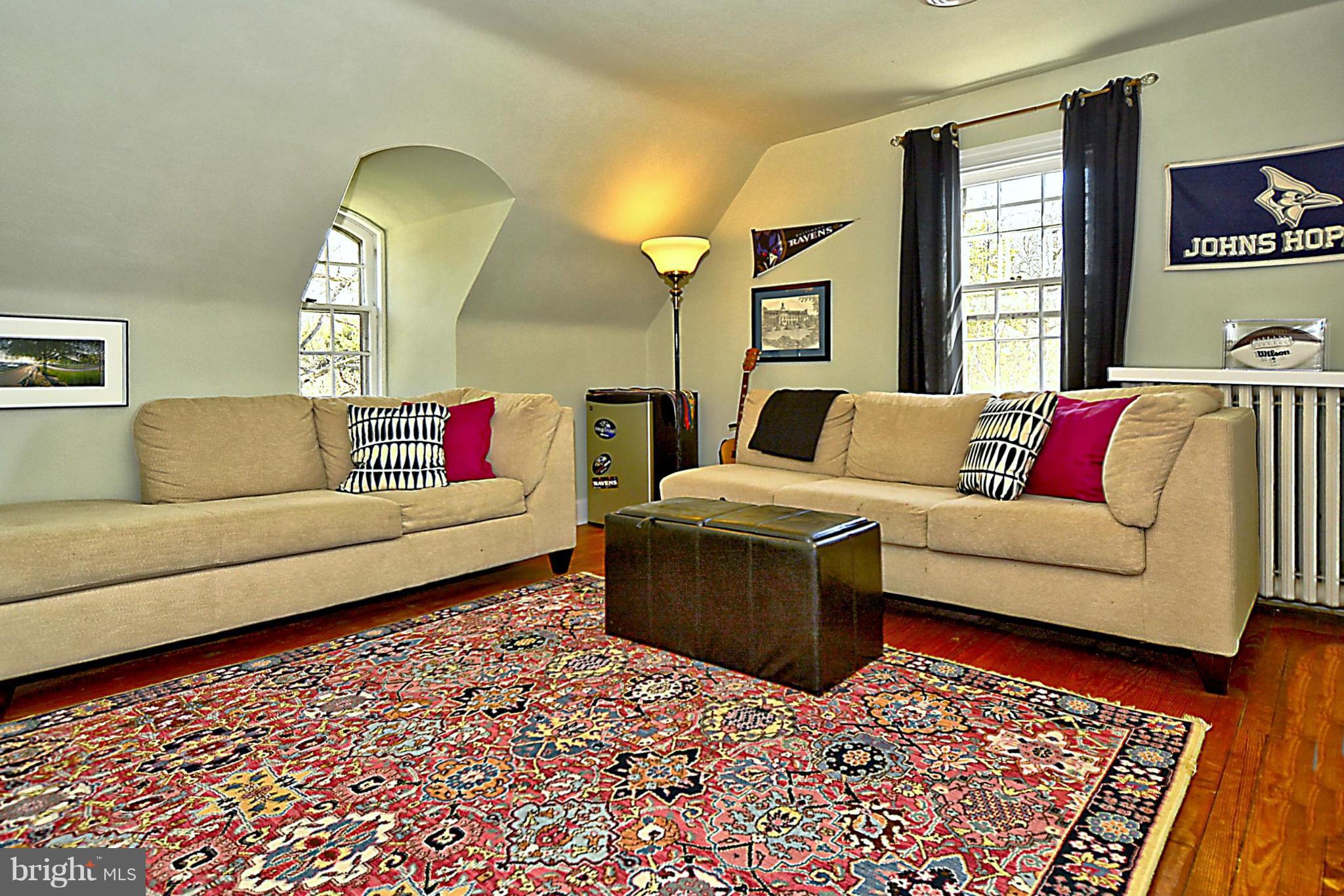 103 Tunbridge Road Baltimore, MD 21212 - Photo 22 of 30 a living room with furniture and a rug