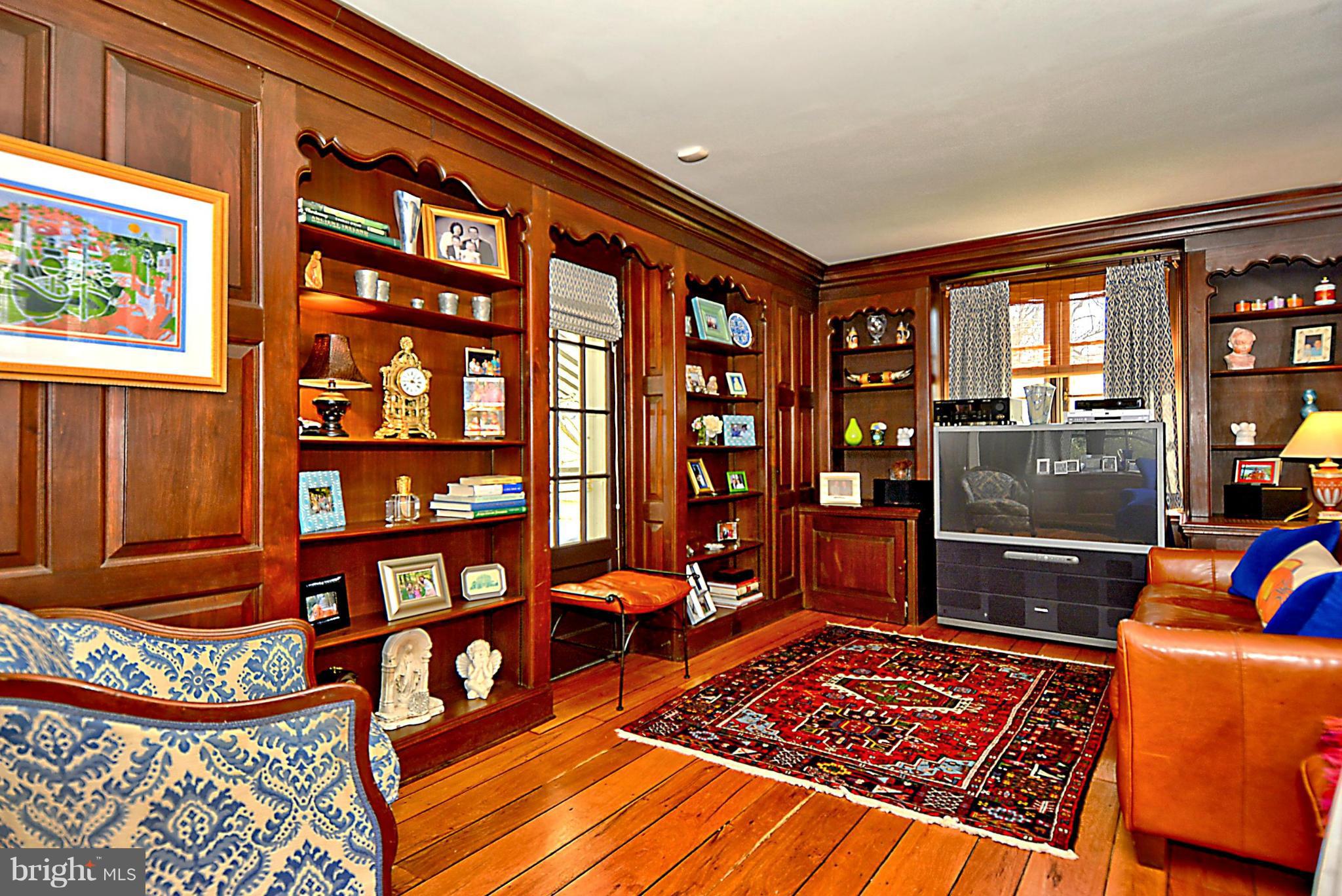 103 Tunbridge Road Baltimore, MD 21212 - Photo 8 of 30 a living room with furniture a rug and a window