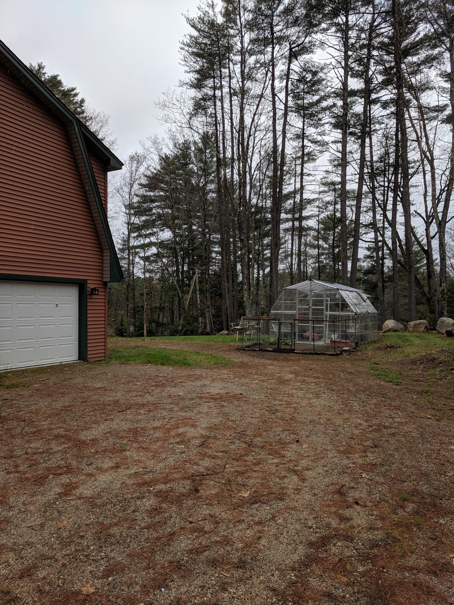 25 Eaton Road Standish, ME 04084 - Photo 16 of 27 25 Eaton side entry to garage and greenh