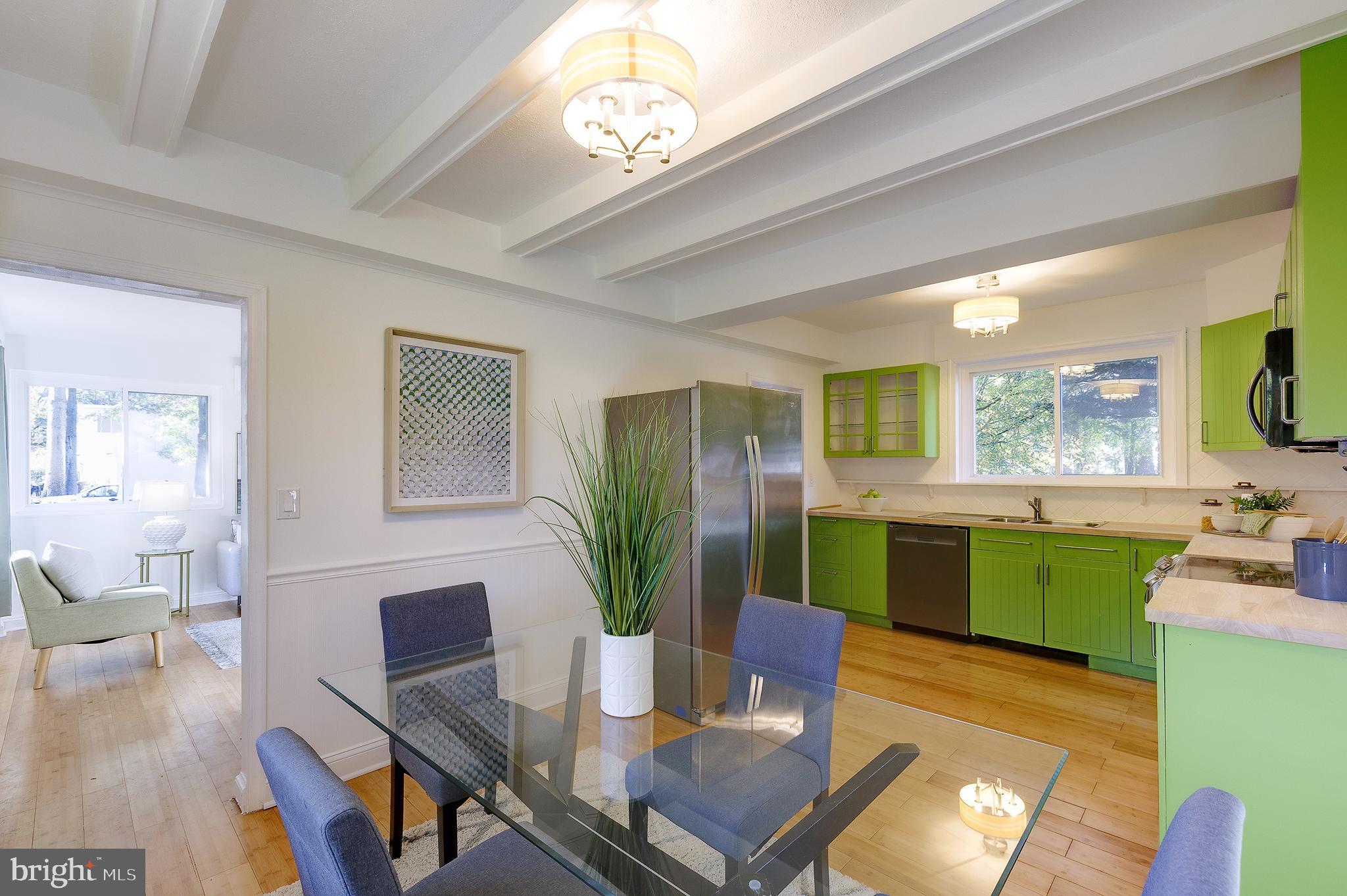 10 Hillside Road Greenbelt, MD 20770 - Photo 16 of 50 a open dining room with furniture window and wooden floor