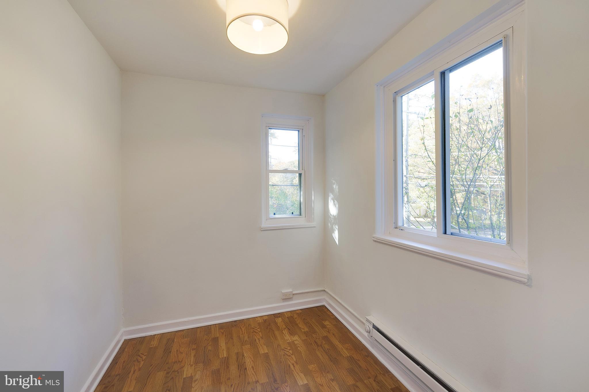 10 Hillside Road Greenbelt, MD 20770 - Photo 39 of 50 an empty room with a window