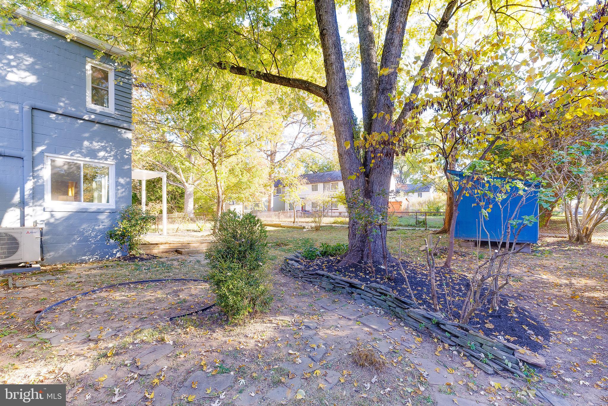 10 Hillside Road Greenbelt, MD 20770 - Photo 45 of 50 a view of a yard with plants and trees