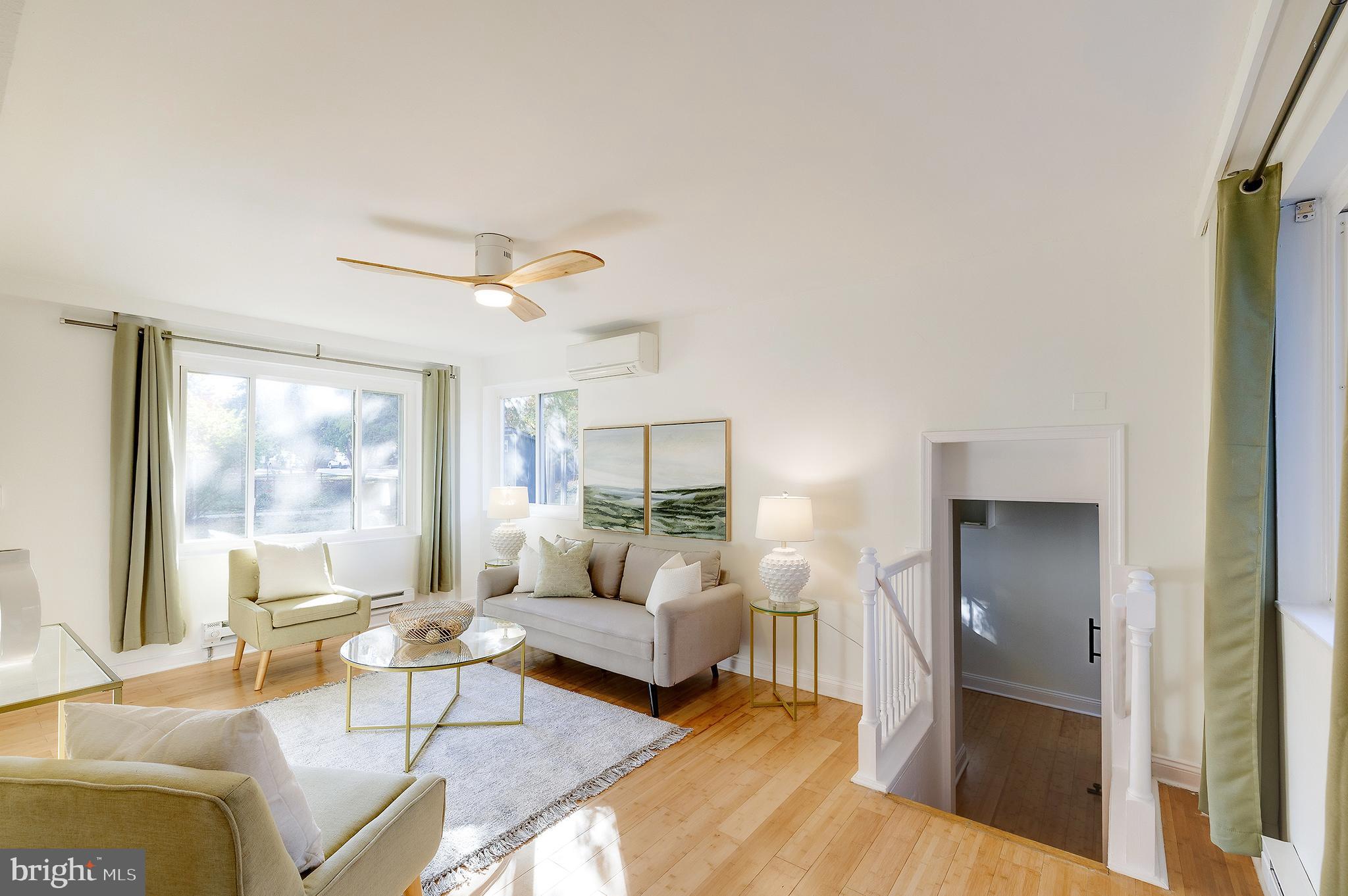 10 Hillside Road Greenbelt, MD 20770 - Photo 9 of 50 a living room with furniture and a large window