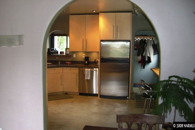 951 Williams Avenue Reno, NV 89503 - Photo 8 of 9 a kitchen with a refrigerator and storage