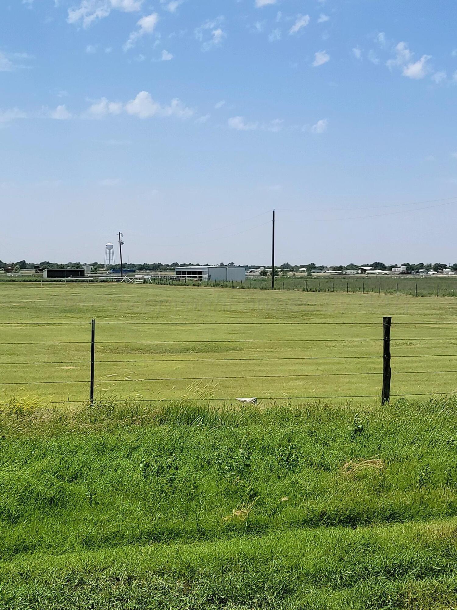 14355 Southeast Se Loop Perryton, TX 79070 - Photo 28 of 33 a view of a lake with a big yard