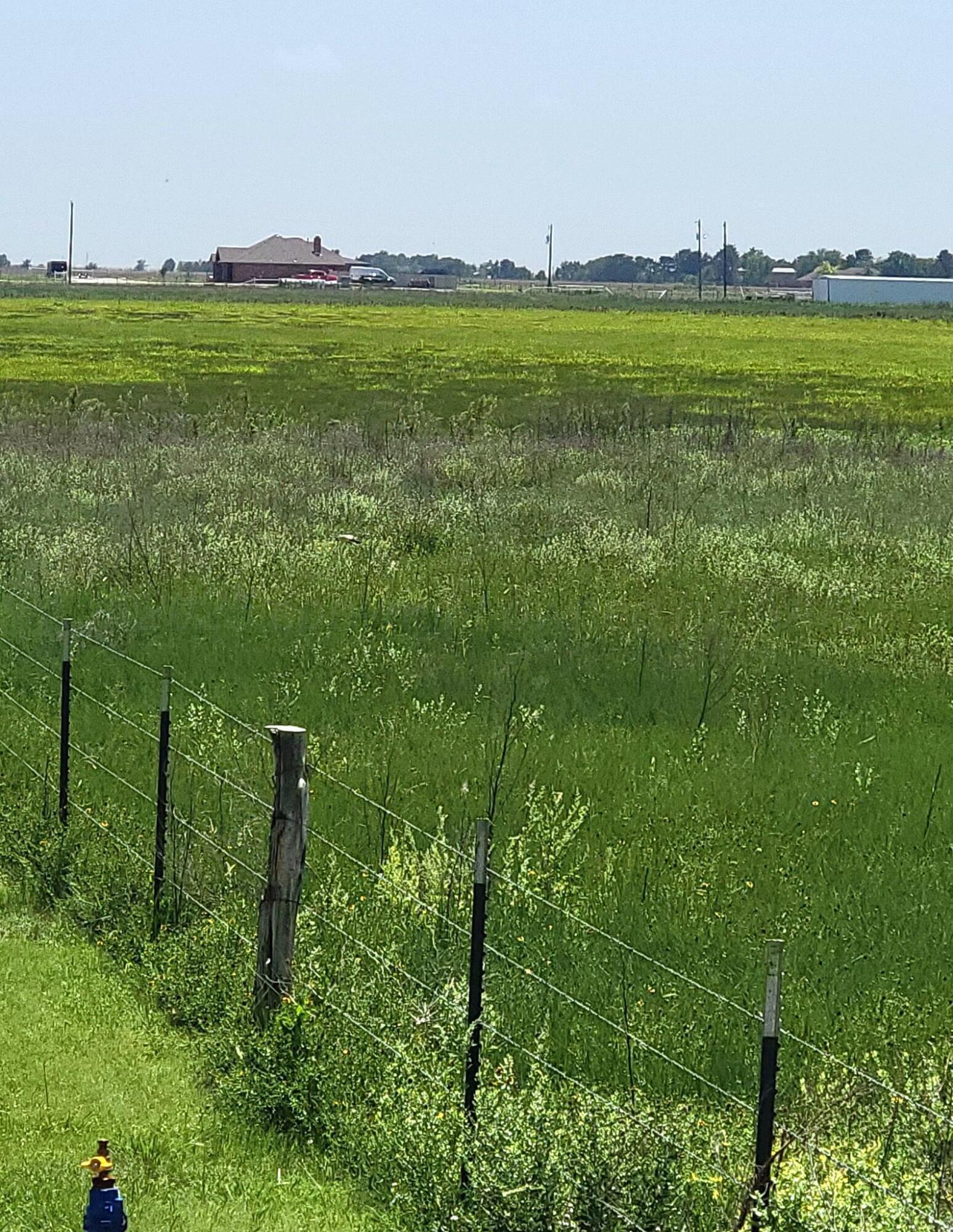 14355 Southeast Se Loop Perryton, TX 79070 - Photo 29 of 33 a view of a lake with a big yard