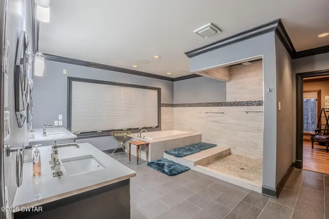 a bed room with a bed and furniture