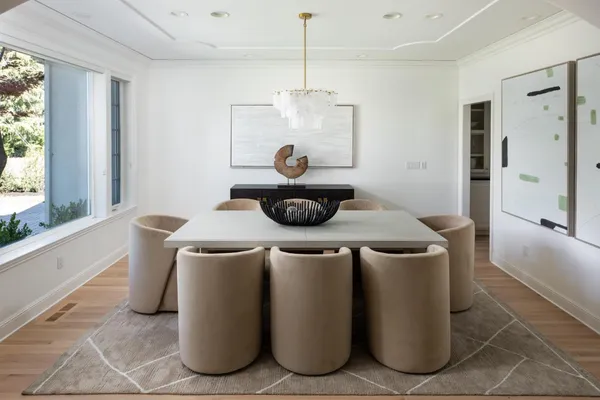 a kitchen with a refrigerator and a stove