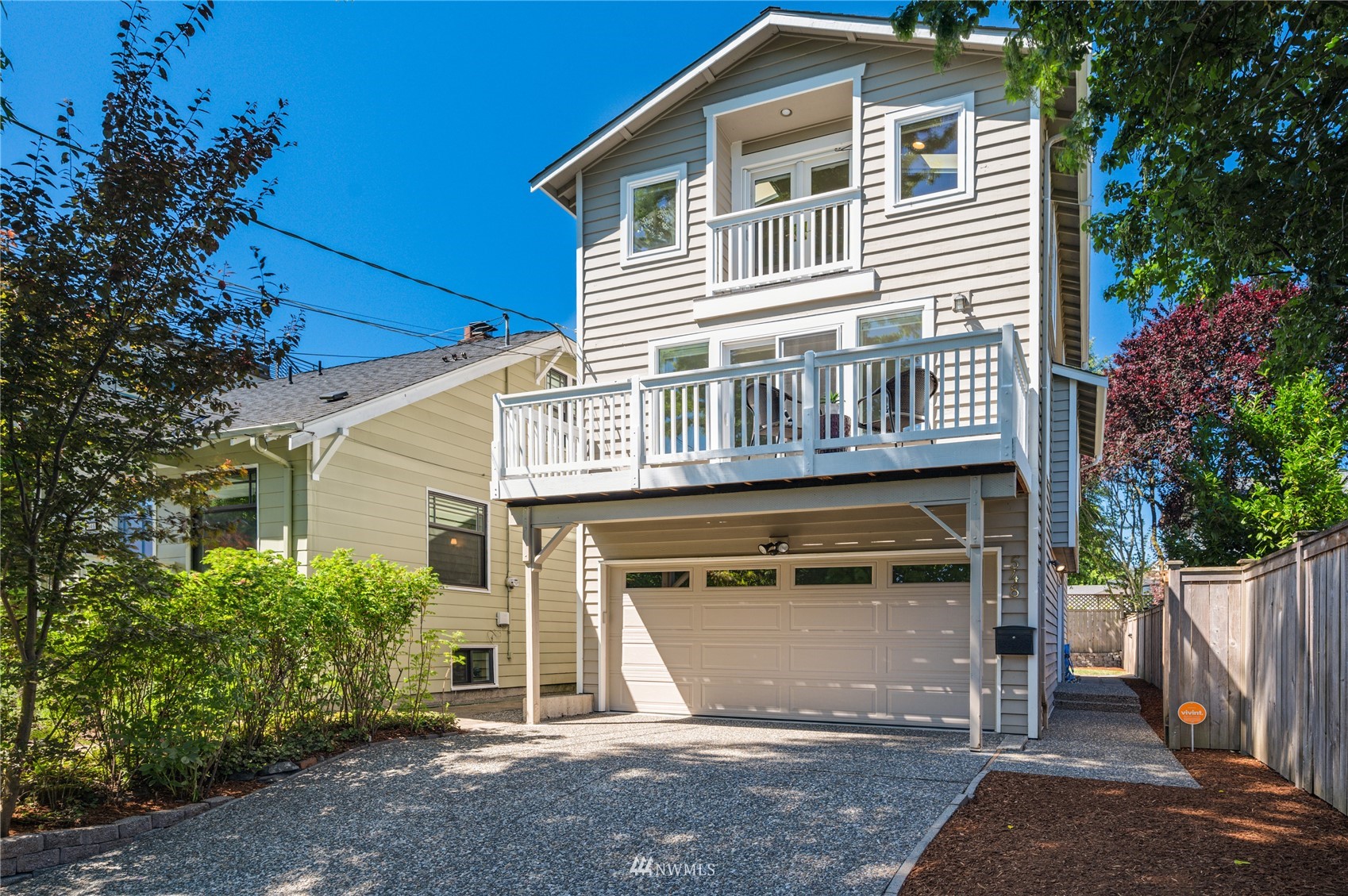 a front view of a house with a garage