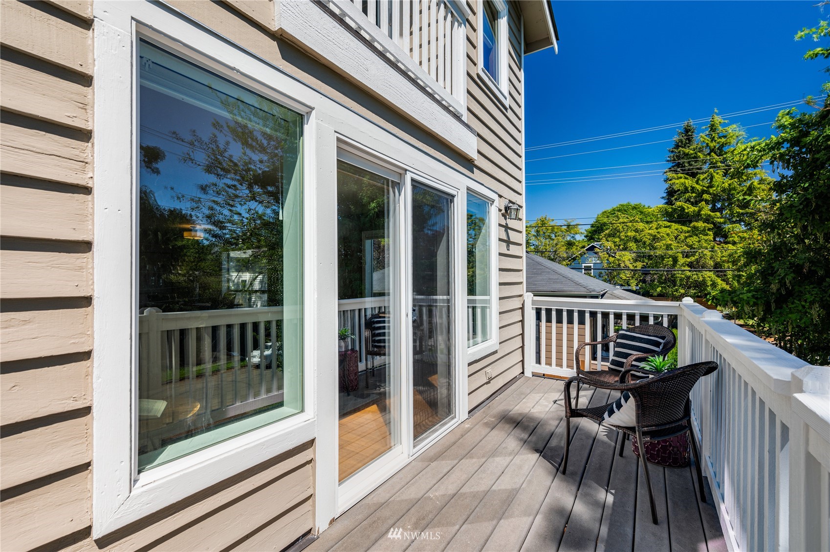 548 North 75th Street Seattle, WA 98103 - Photo 16 of 39 a view of a balcony with chairs