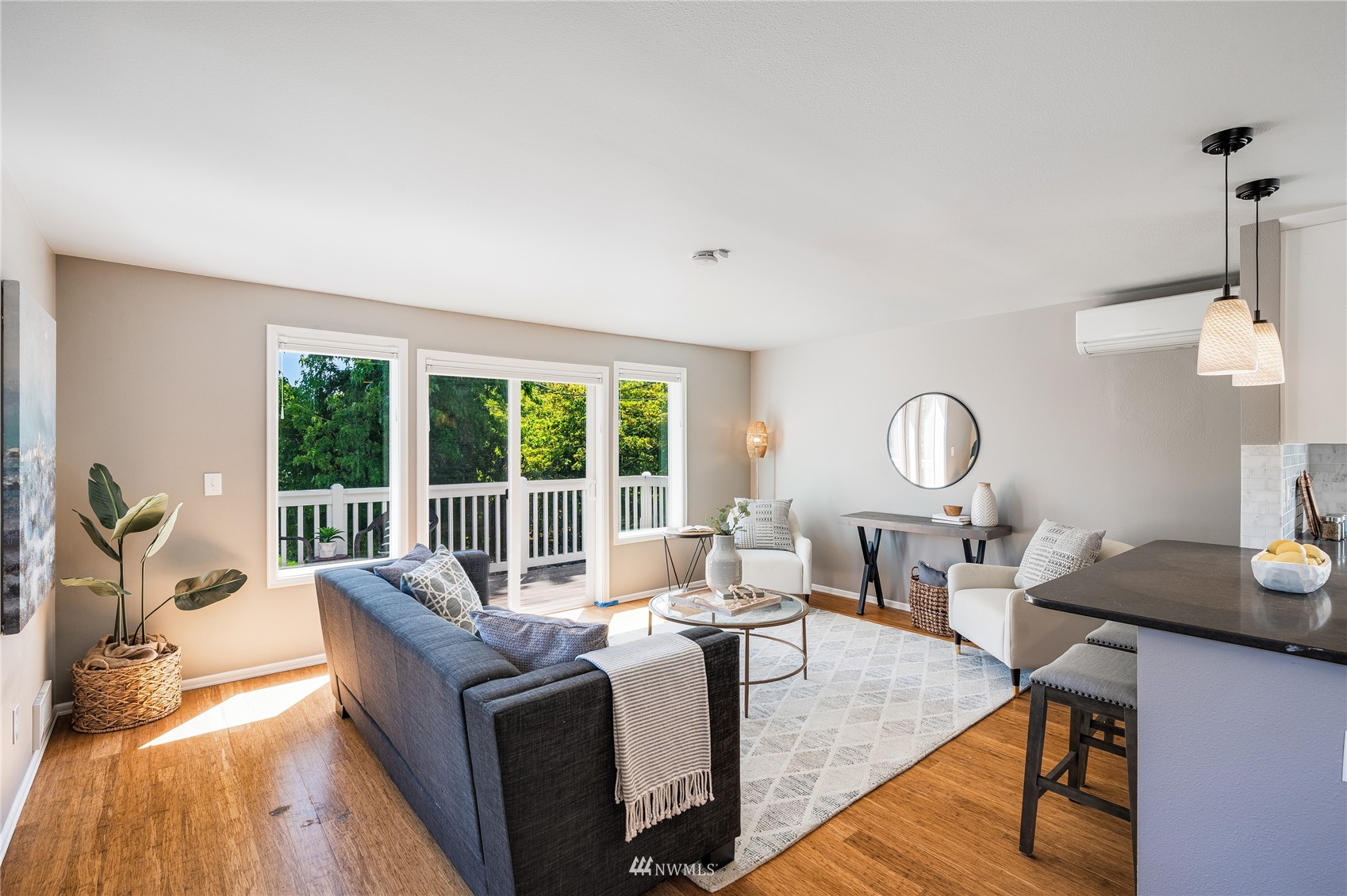 548 North 75th Street Seattle, WA 98103 - Photo 18 of 39 a living room with furniture a large window and wooden floor