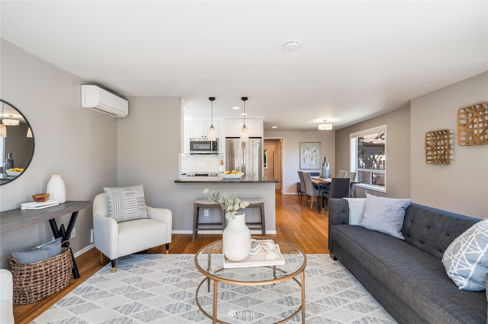 548 North 75th Street Seattle, WA 98103 - Photo 20 of 39 a living room with furniture and a wooden floor