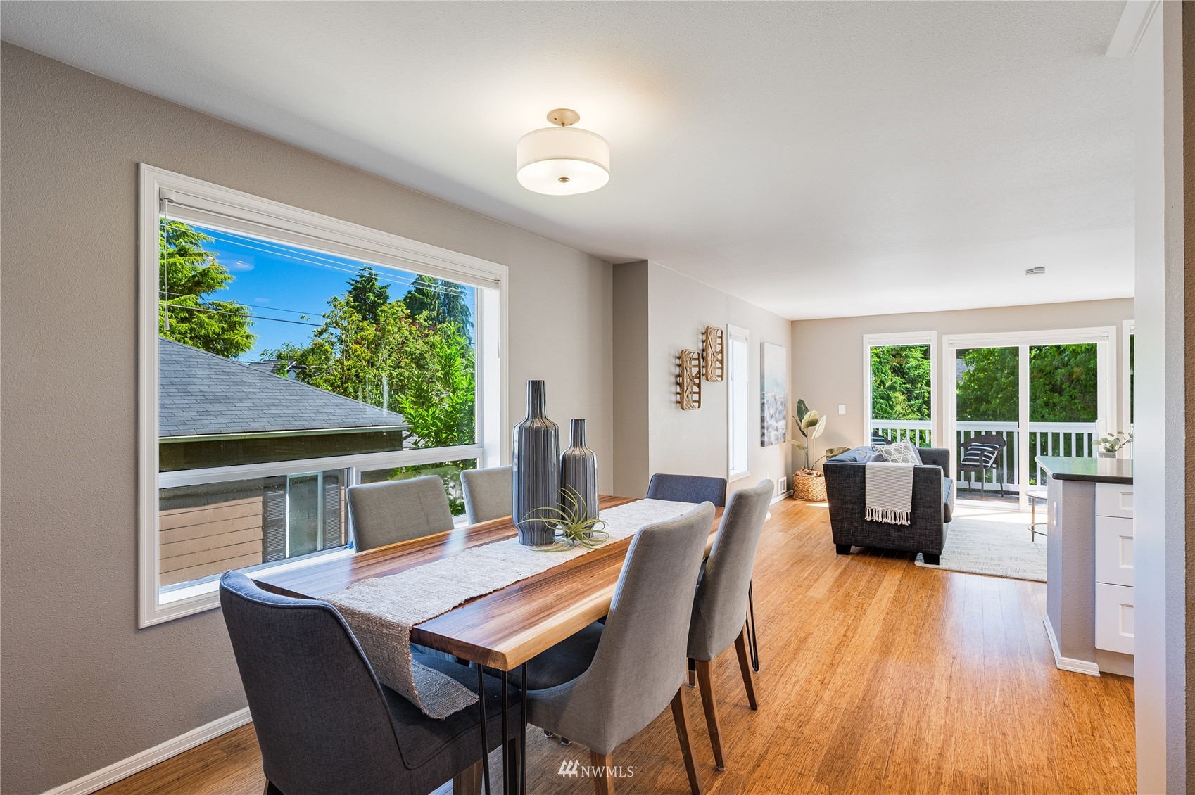 548 North 75th Street Seattle, WA 98103 - Photo 23 of 39 a dining room with furniture window and wooden floor