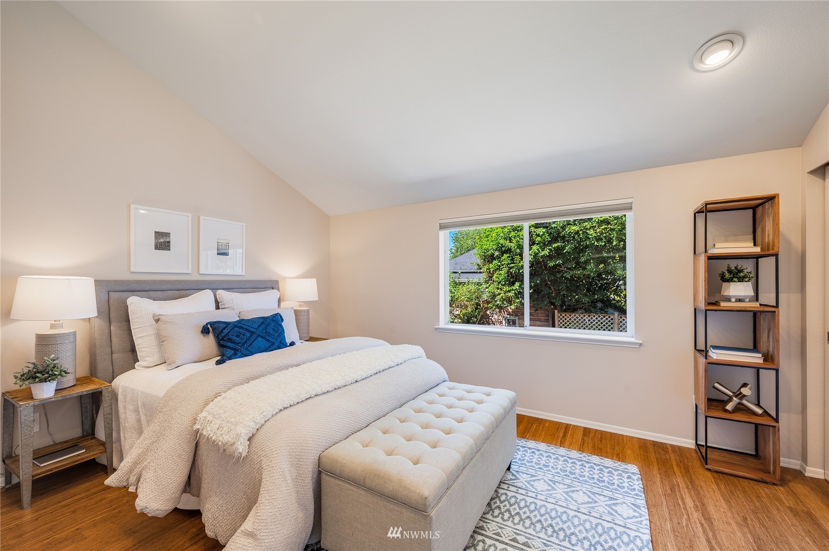 548 North 75th Street Seattle, WA 98103 - Photo 24 of 39 a bed room with a bed and a window