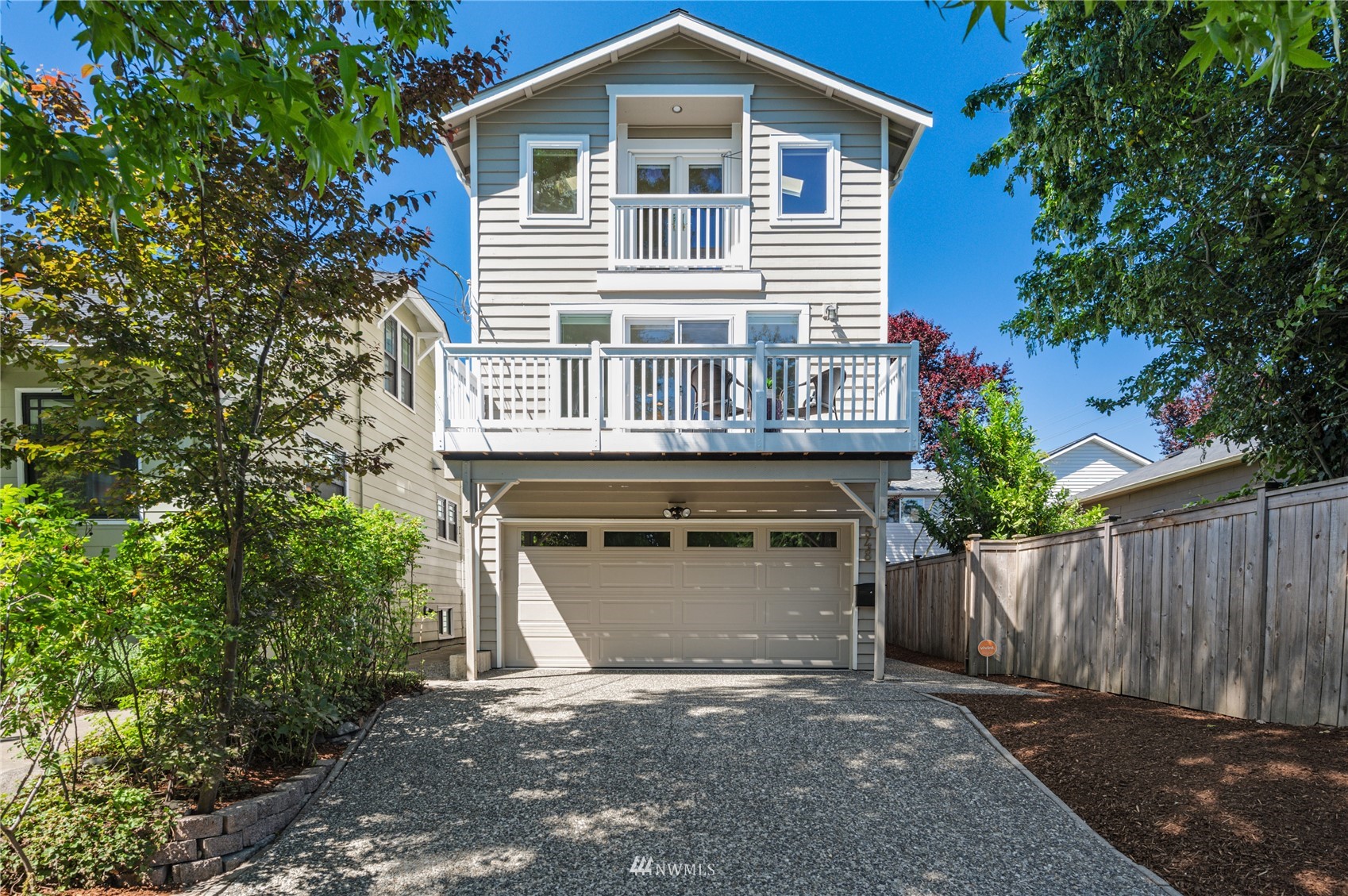 548 North 75th Street Seattle, WA 98103 - Photo 39 of 39 a front view of a house with a yard and garage