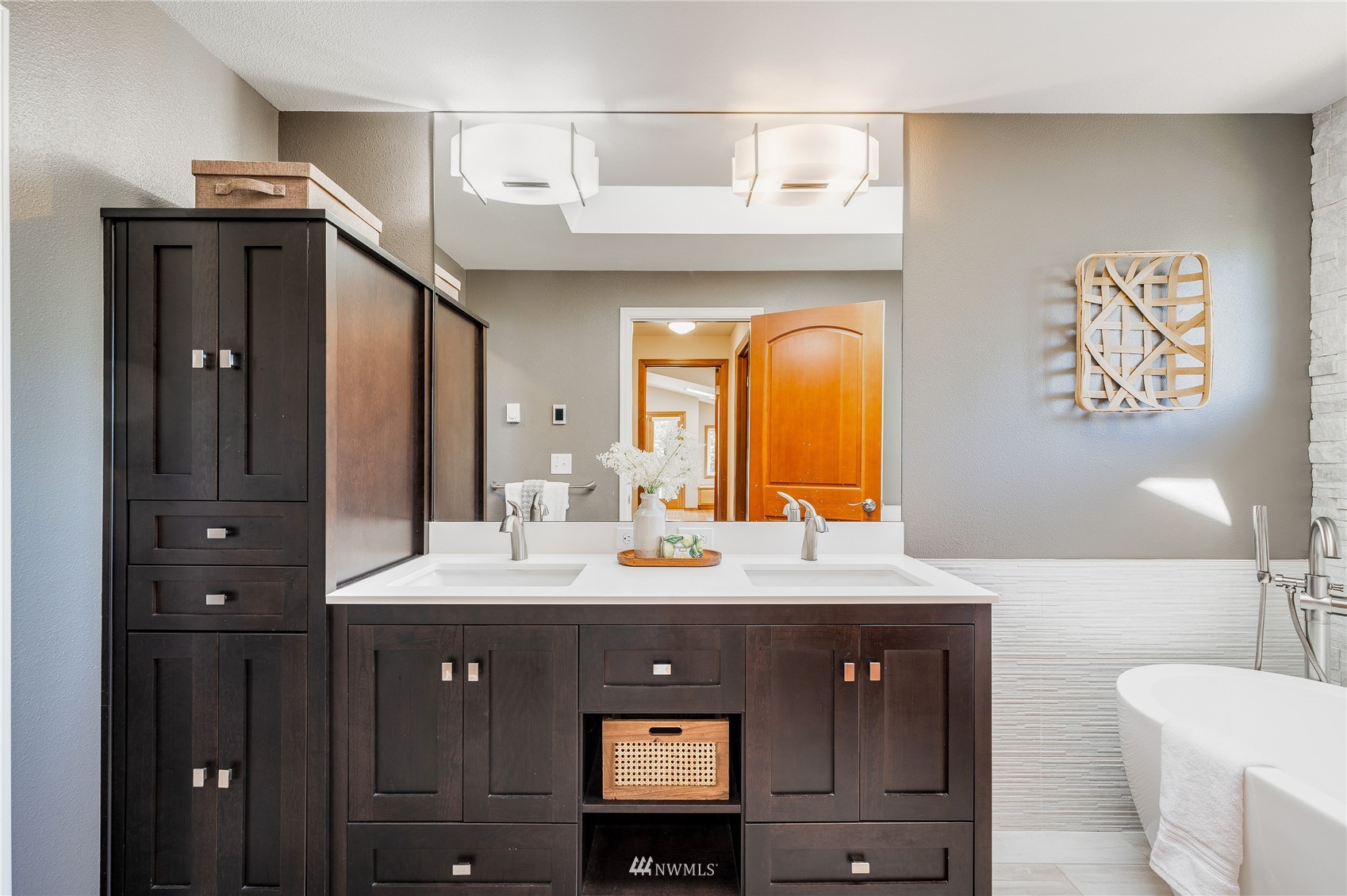 548 North 75th Street Seattle, WA 98103 - Photo 8 of 39 a bathroom with a sink vanity and a mirror