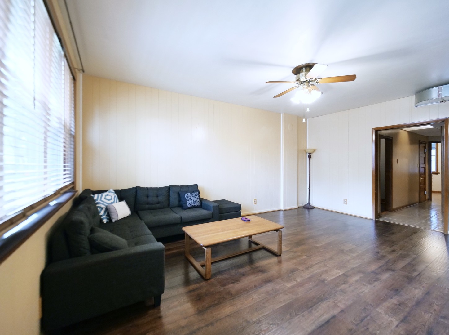 4556 South Justine Street Chicago, IL 60609 - Photo 12 of 50 a living room with furniture and a window