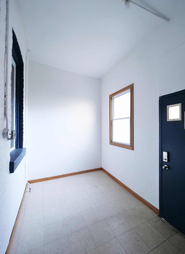 4556 South Justine Street Chicago, IL 60609 - Photo 24 of 50 an empty room with a window