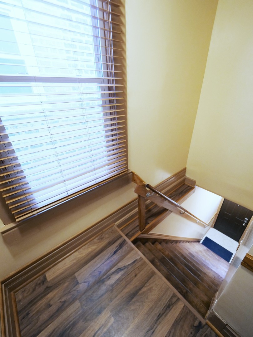 4556 South Justine Street Chicago, IL 60609 - Photo 27 of 50 a view of a room with wooden floor