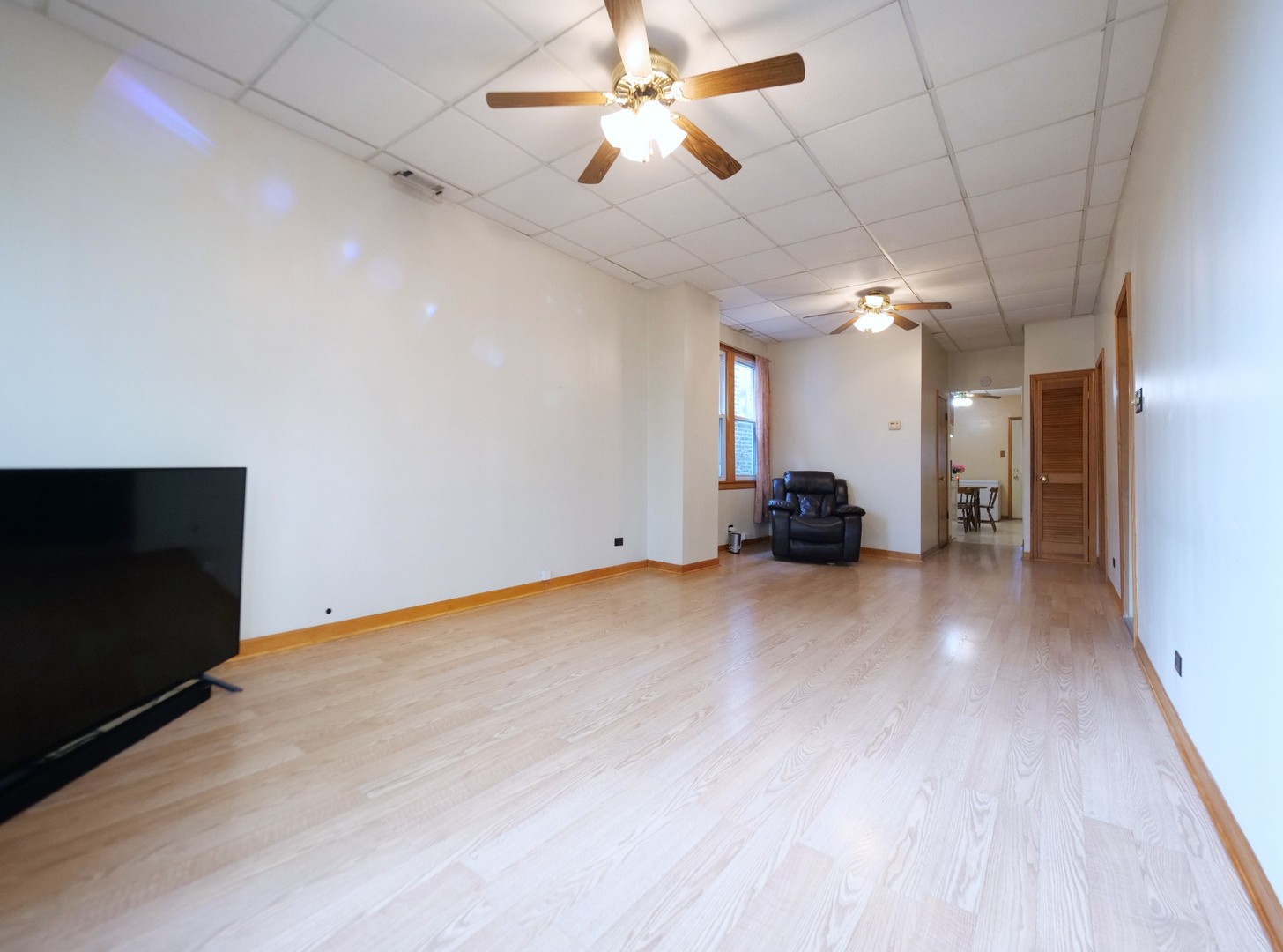 4556 South Justine Street Chicago, IL 60609 - Photo 28 of 50 a view of a livingroom with a workspace