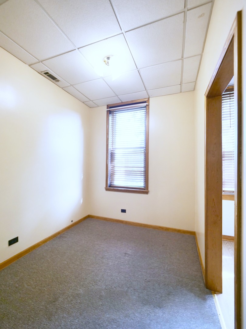 4556 South Justine Street Chicago, IL 60609 - Photo 31 of 50 a view of an empty room with a window