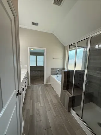 a white bath tub sitting next to a window