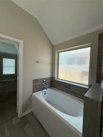 a white toilet sitting in a bathroom