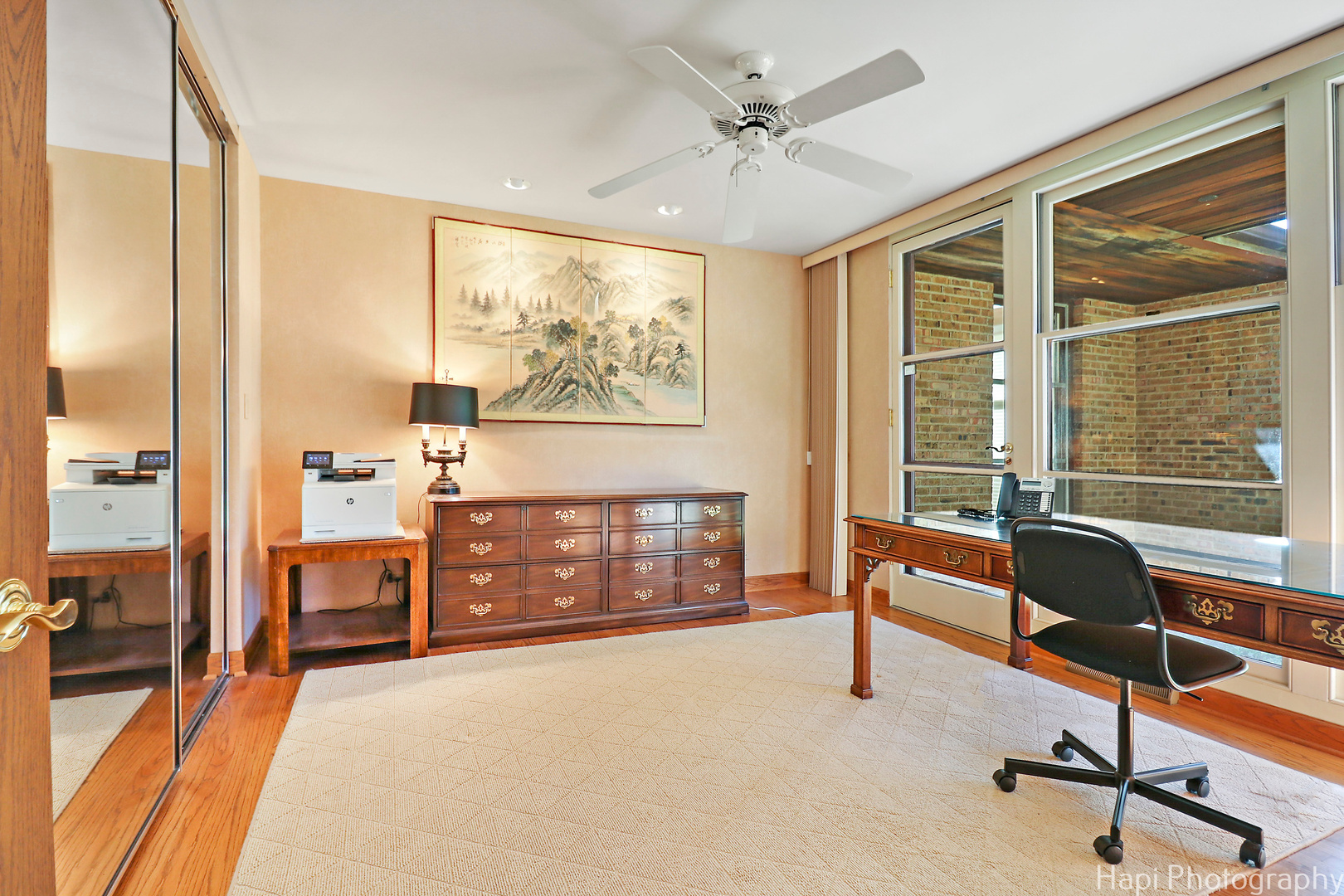 80 Meadow Hill Road Barrington Hills, IL 60010 - Photo 22 of 25 a view of a livingroom with furniture and a flat screen tv