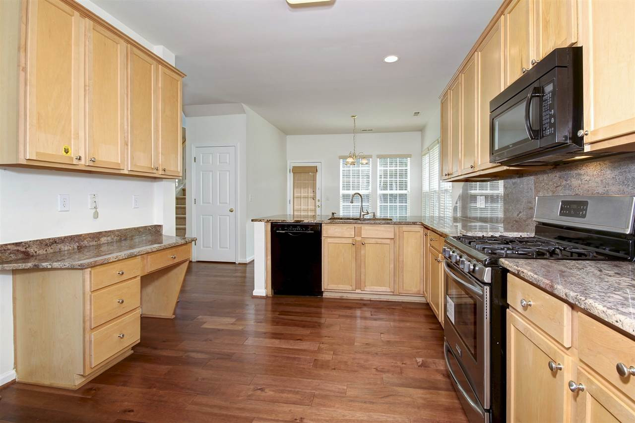 7444 Lagrange Drive Raleigh, NC 27613 - Photo 8 of 30 View into your expansive kitchen with lots of counter space! Kitchen