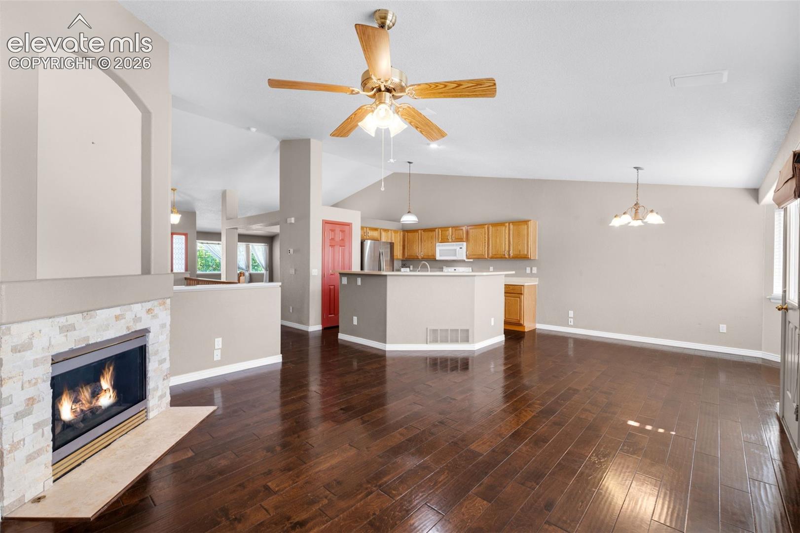 7840 Midnight Road Peyton, CO 80831 - Photo 15 of 48 Looking from family rm to kitchen - A great gathering space
