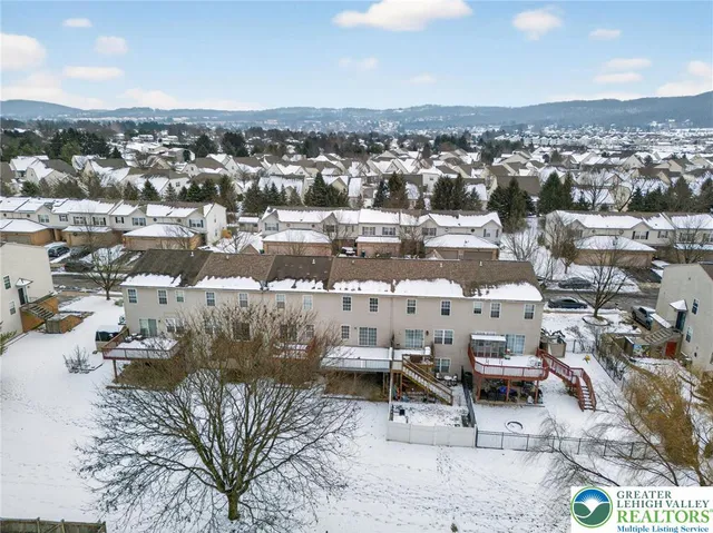 an aerial view of a city with lots of residential buildings