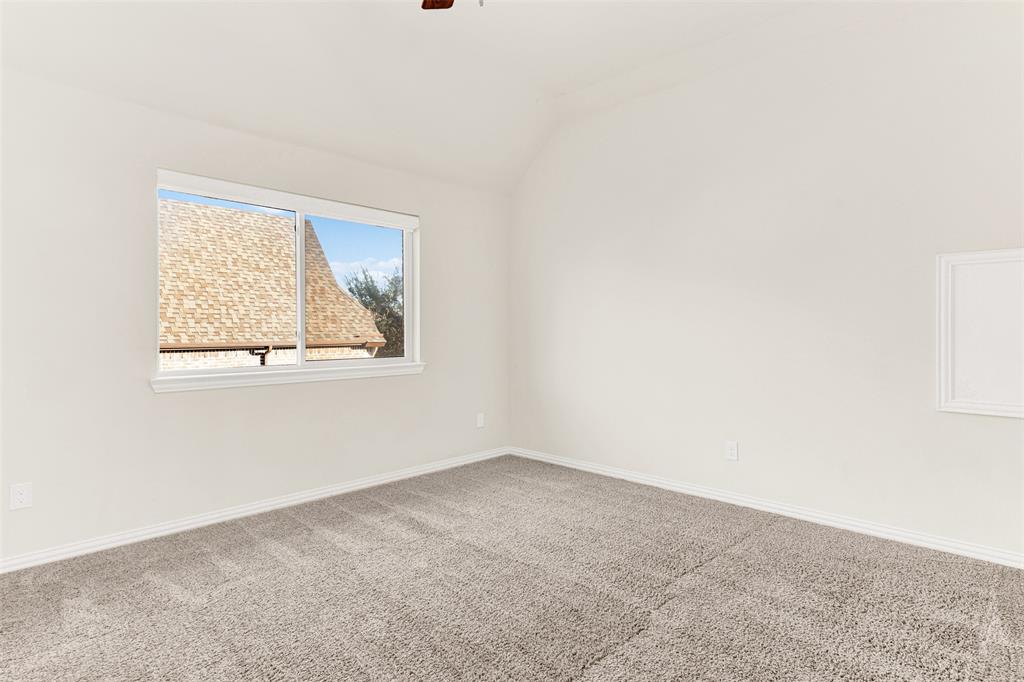 2804 Seabiscuit Road Celina, TX 75009 - Photo 22 of 40 an empty room with a window