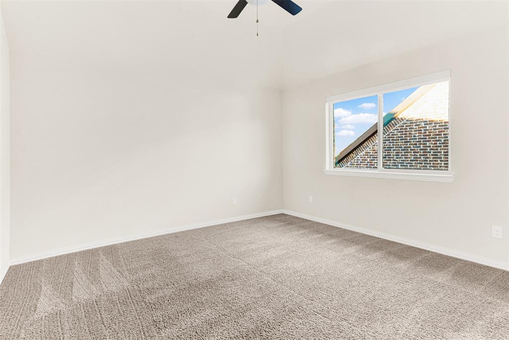 2804 Seabiscuit Road Celina, TX 75009 - Photo 27 of 40 an empty room with a window