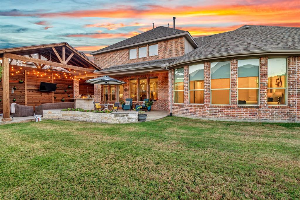 2804 Seabiscuit Road Celina, TX 75009 - Photo 33 of 40 a front view of a house with a garden
