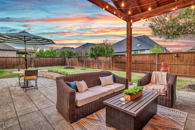 a view of a house with a yard porch and sitting area