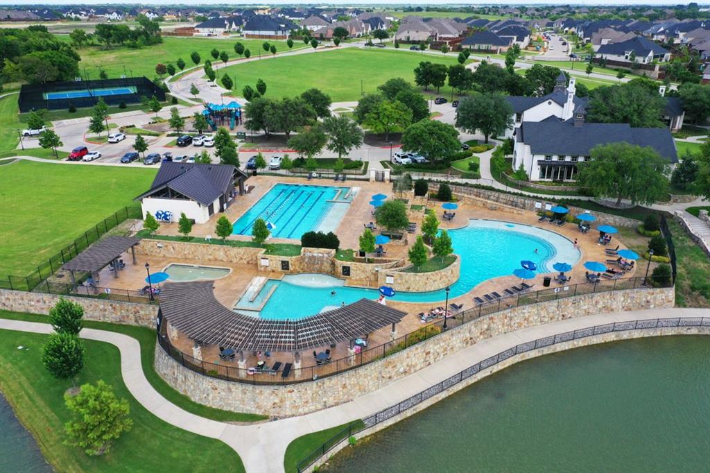 2804 Seabiscuit Road Celina, TX 75009 - Photo 39 of 40 an aerial view of a house with outdoor space pool patio and lake view