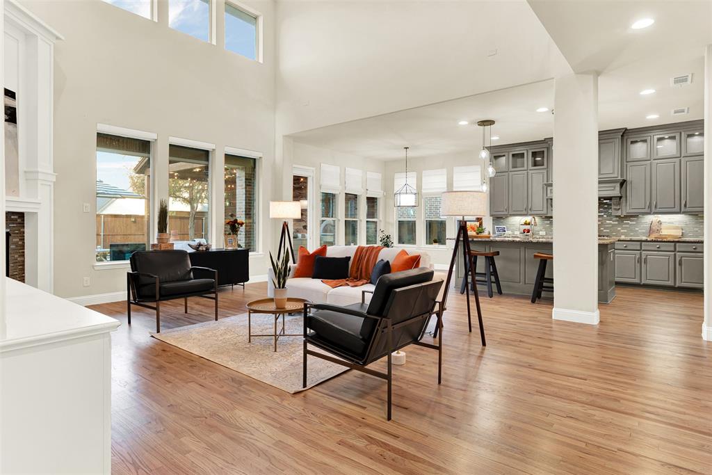 2804 Seabiscuit Road Celina, TX 75009 - Photo 8 of 40 a living room with furniture and wooden floor