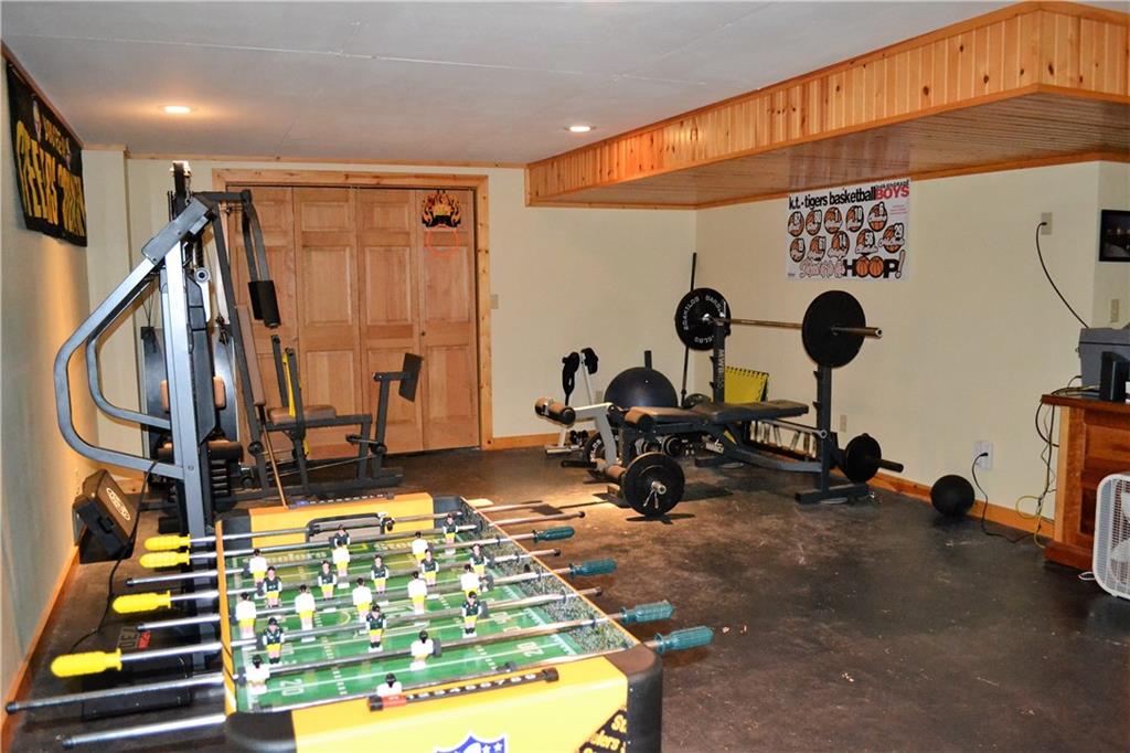 119 Pine Tree Road Kittanning, PA 16201 - Photo 21 of 25 Attached to the game room, this bonus space is currently used as a workout room.