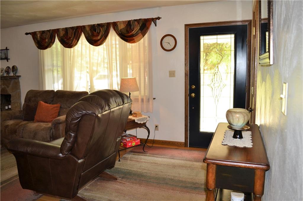 119 Pine Tree Road Kittanning, PA 16201 - Photo 5 of 25 The entry has a coat closet and opens to the large living room.