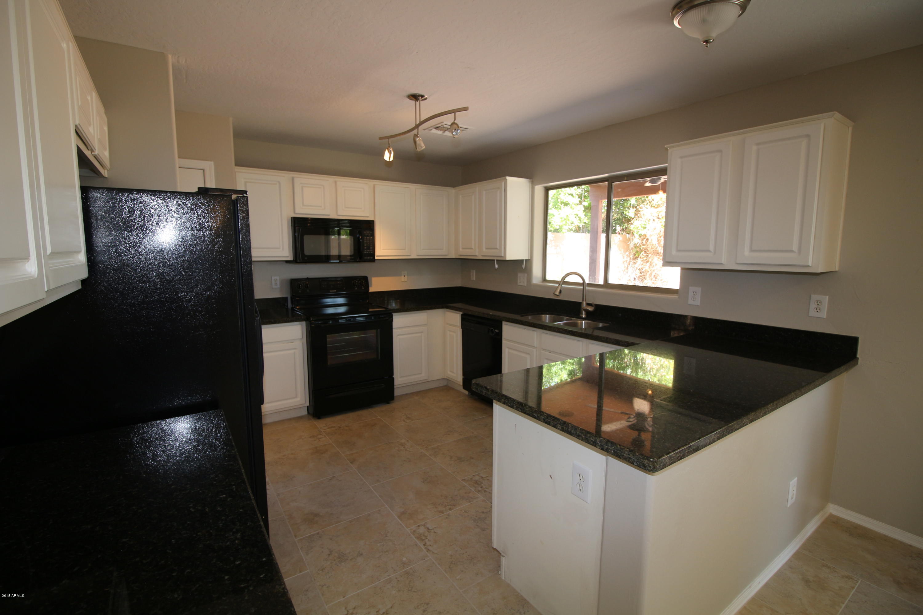 2736 East Gary Way Phoenix, AZ 85042 - Photo 13 of 33 IMG_1778