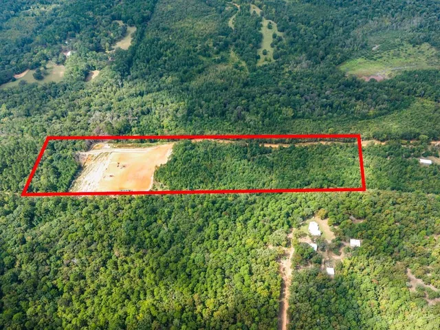 a view of a yard with an outdoor space