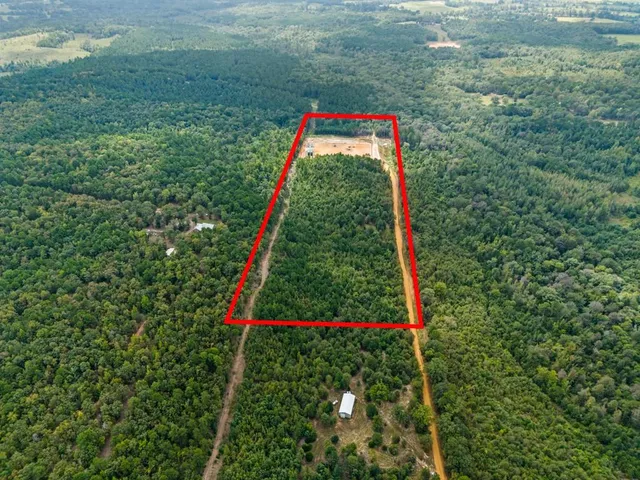 a view of a yard with an outdoor space