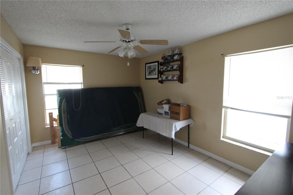 5046 Kenmore Street Spring Hill, FL 34608 - Photo 10 of 19 a living room with furniture