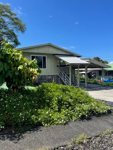 a kitchen with stainless steel appliances granite countertop a stove and a refrigerator