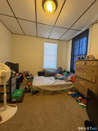 a room with furniture and a chair