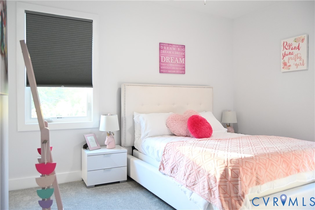 2721 Terminal Avenue Richmond, VA 23234 - Photo 16 of 30 a bedroom with a bed and a window